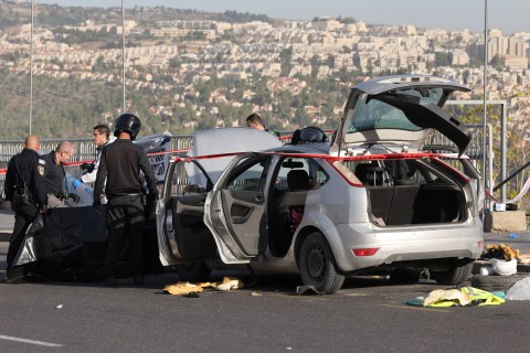Two Palestinians open fire at Jerusalem bus stop, killing three
