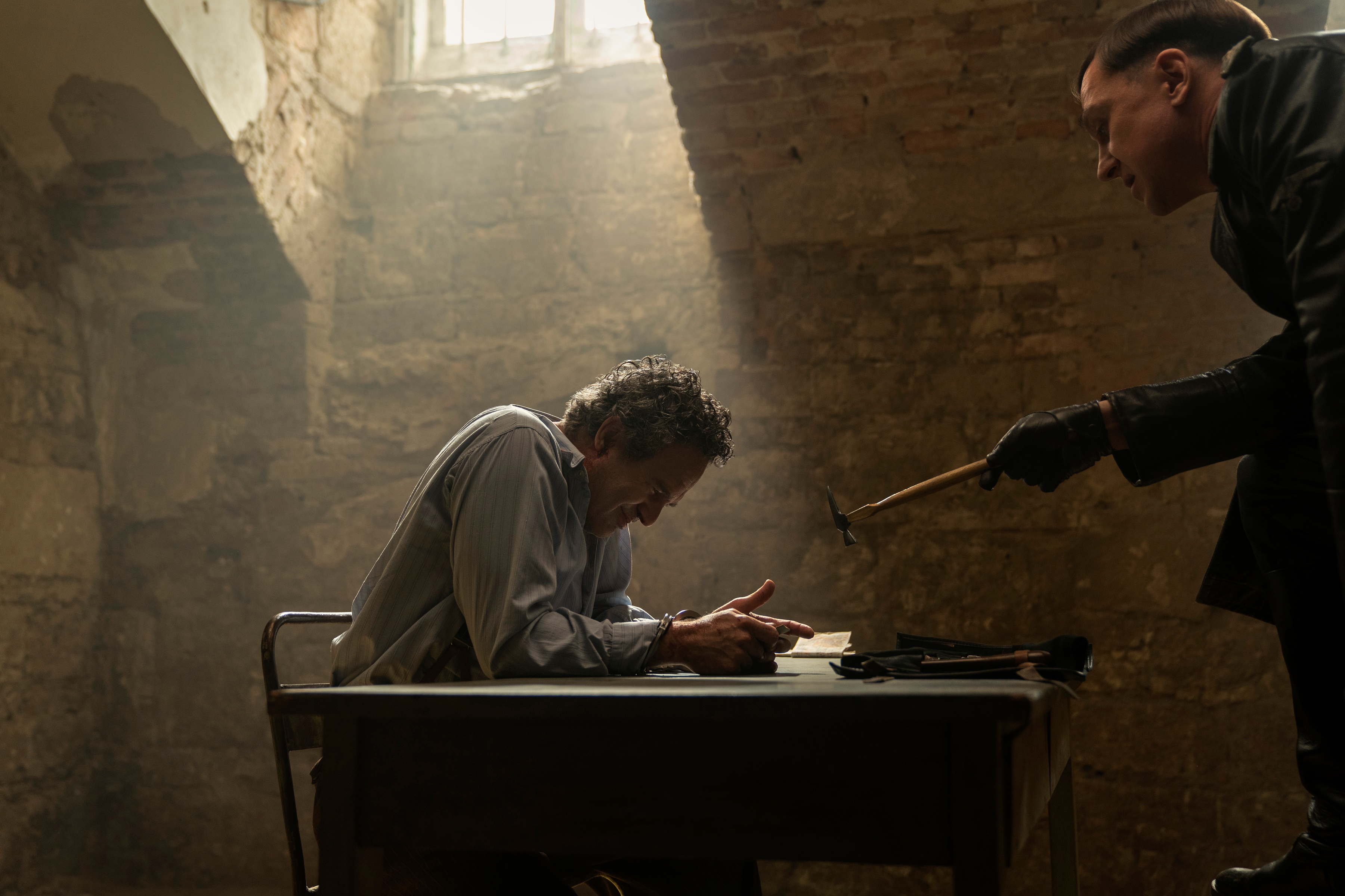 All the Light We Cannot See. (L to R) Mark Ruffalo as Daniel LeBlanc, Lars Eidinger as Sergeant Major Reinhold von Rumpel in episode 104 of 'All the Light We Cannot See'. Image: Atsushi Nishijima/Netflix © 2023