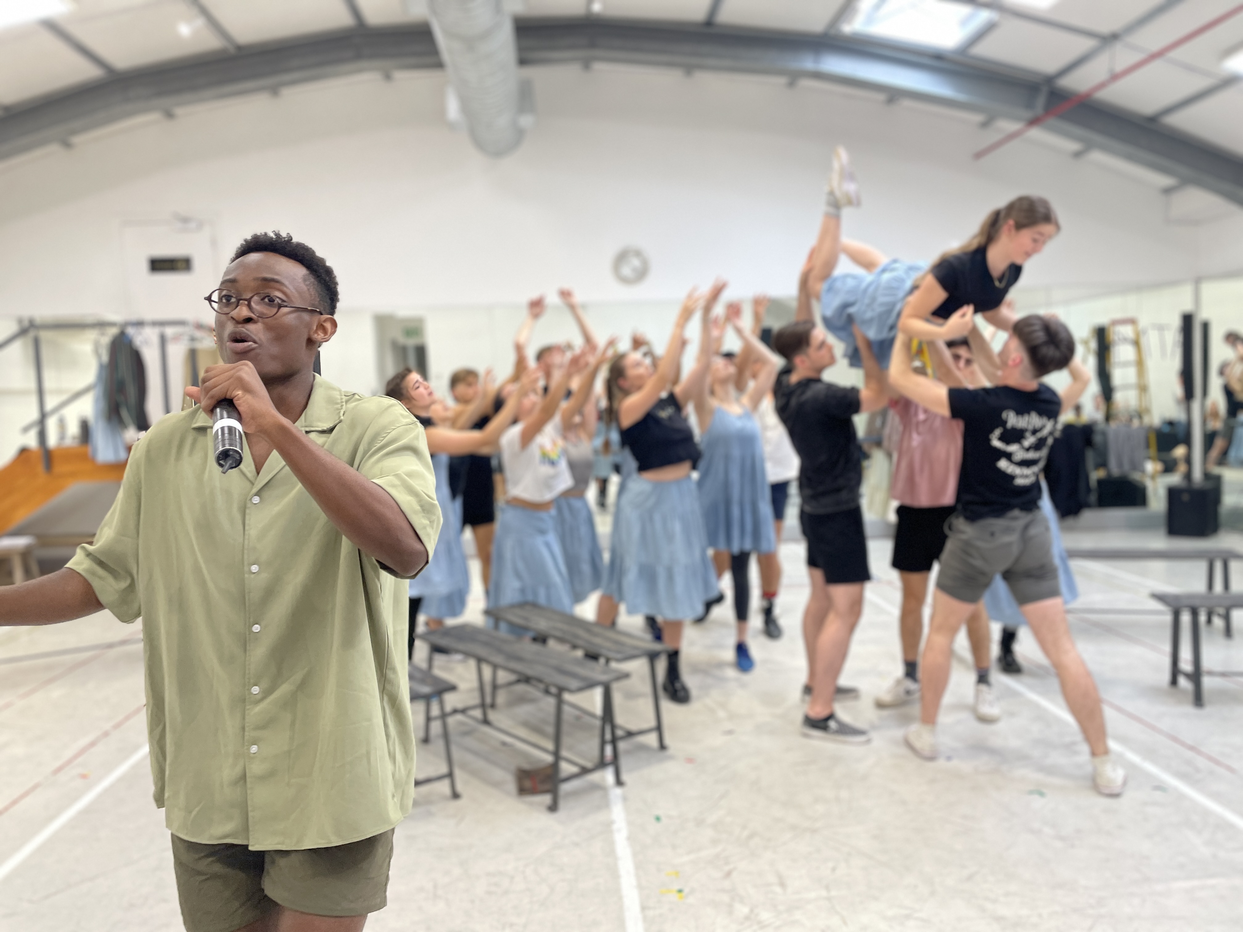 Austin Tshikosi sings while other cast members dance during a rehearsal of 'Spring Awakening'. Image: Duane Alexander