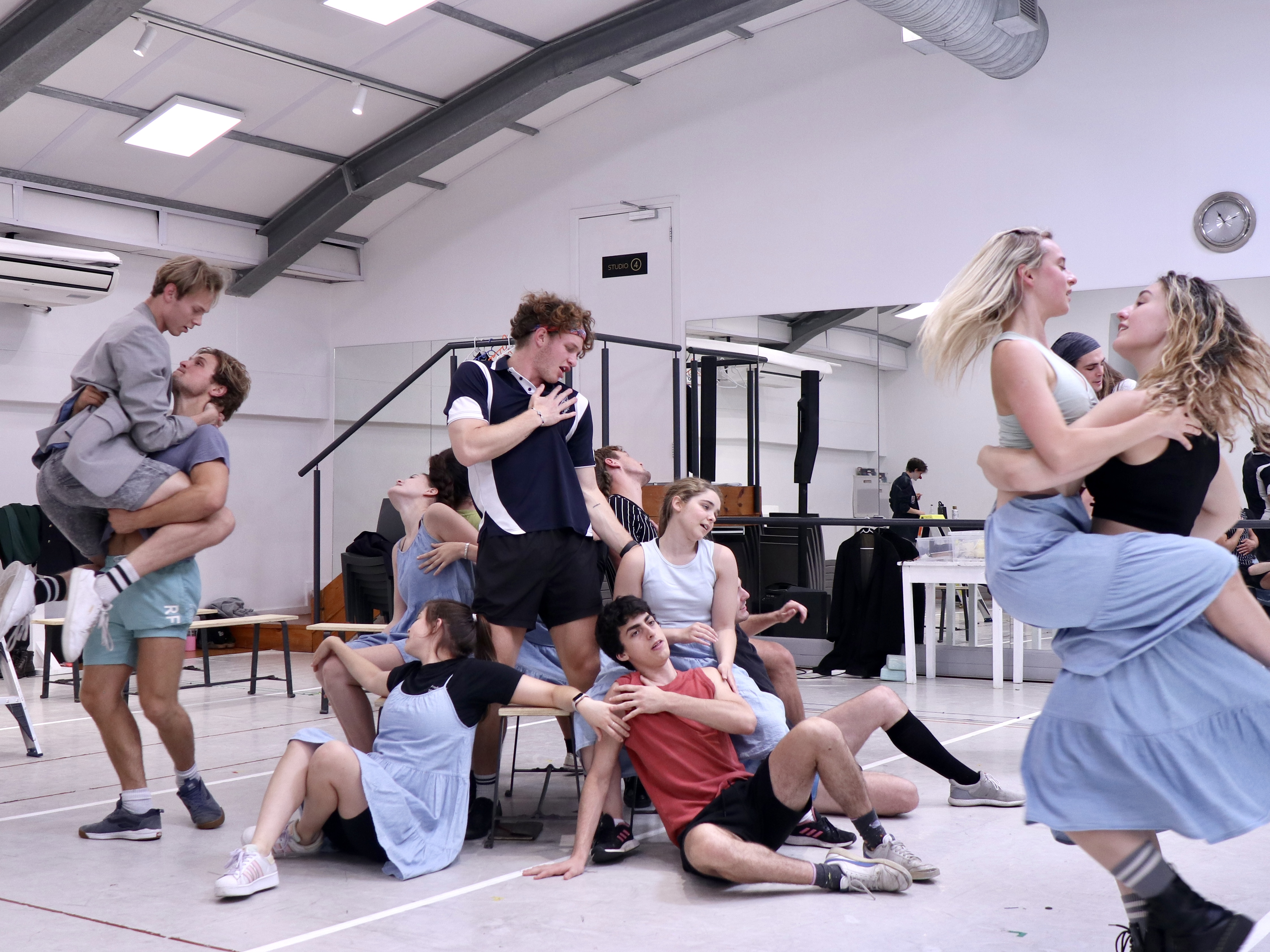 Dylan Janse van Rensburg (hand to heart in the centre) and some of the cast rehearsing a dance number from 'Spring Awakening'. Image: Duane Alexander