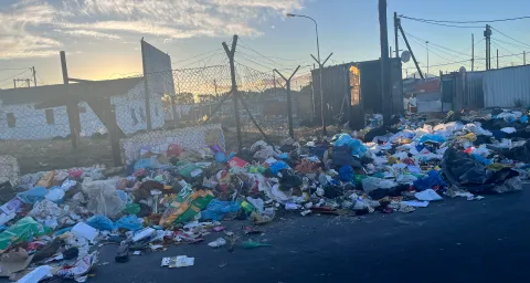 Cape Town waste management director suspended as communities drown in trash