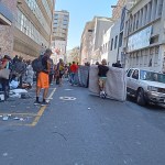 Hundreds of occupants evicted onto Cape Town streets from city centre buildings after court order