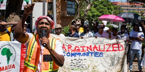 ‘Nothing about us, without us,’ mining-affected communities demand in protest outside DMRE offices