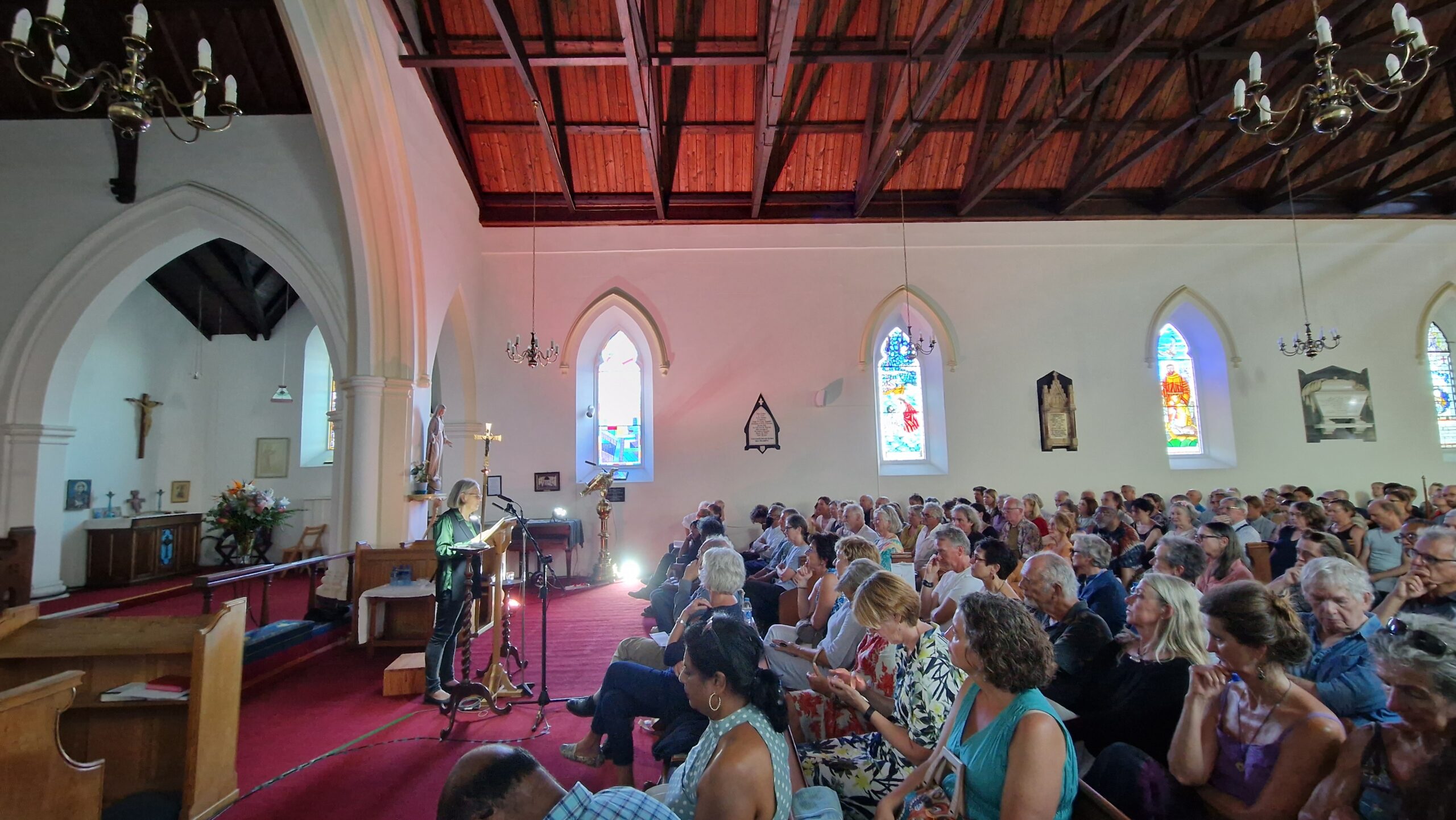 Antjie Krog reads to the audience at the Simon's Town Literary Festival in 2023. Image: Erica Lombard / Books on the Bay