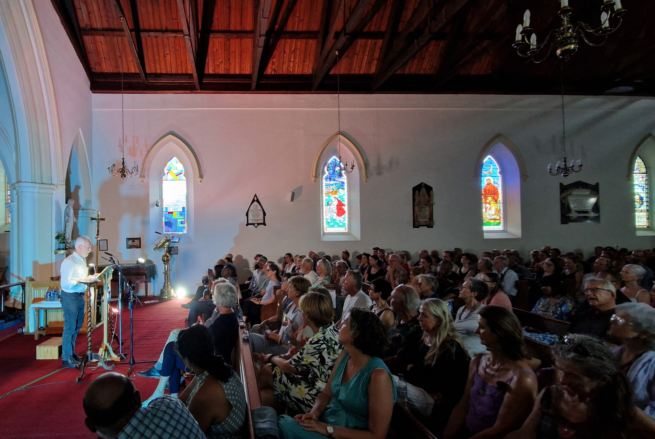 J. M. Coetzee reading to the packed church at the Simon's Town Literary Festival in 2023. Image: Erica Lombard / Books on the Bay
