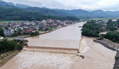 China evacuates entire town as record rains, winds lash its south