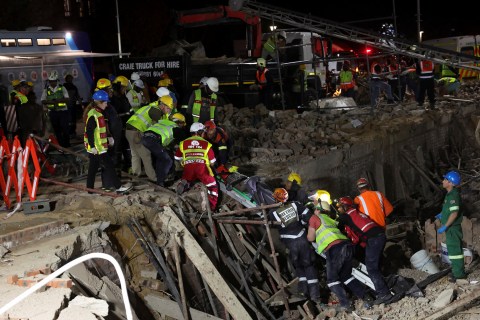 Frantic search for dozens missing in George building collapse