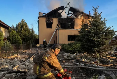 Firefighters work at a site of a Russian missile strike in Kharkiv, Ukraine earlier this month. (Photo: Reuters/Vyacheslav Madiyevskyy)