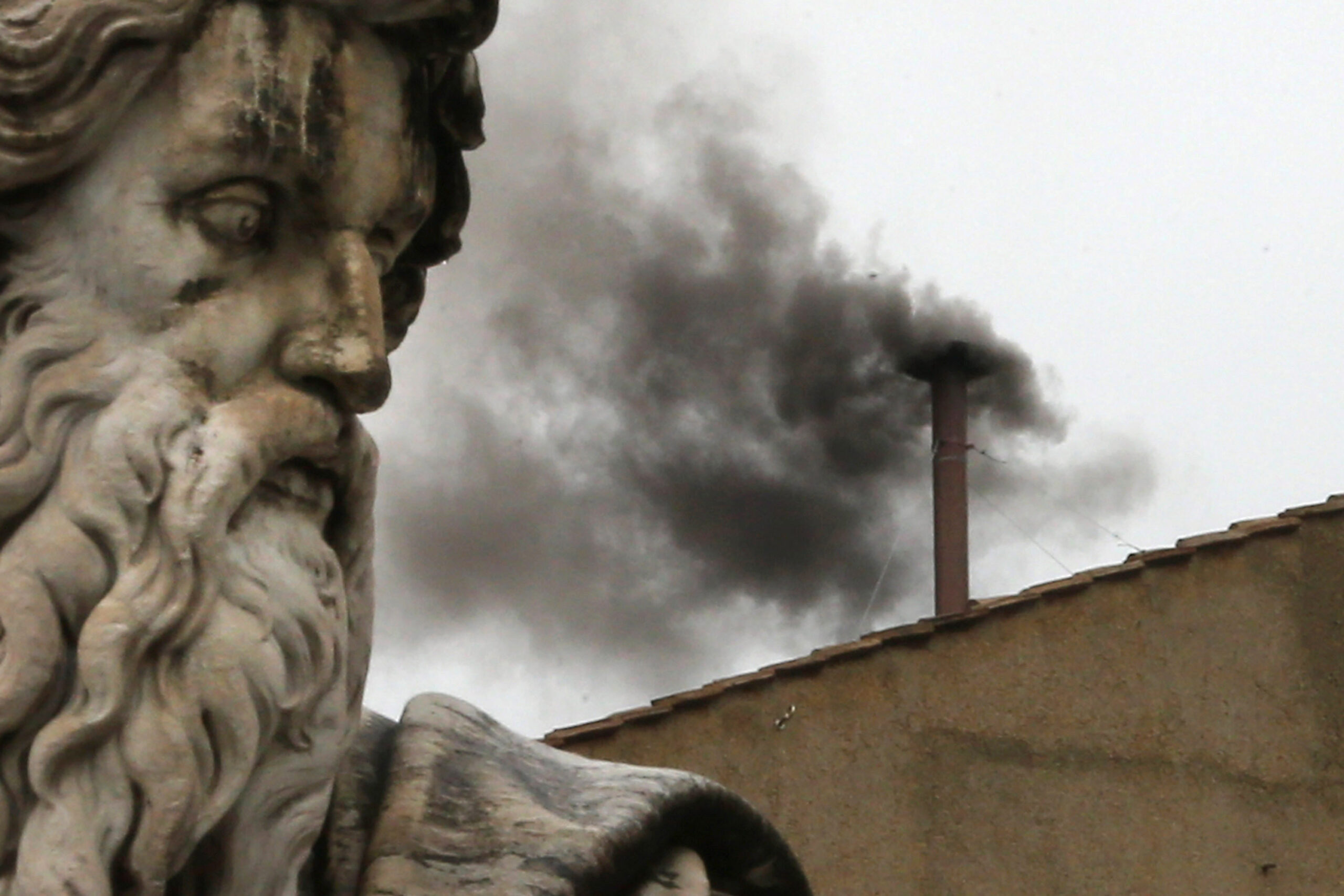 Black smoke billows from the chimney on the roof of the Sistine Chapel indicating that the College of Cardinals have failed to elect a new Pope on March 13, 2013 in Vatican City, Vatican. Pope Benedict XVI's successor is being chosen by the College of Cardinals in Conclave in the Sistine Chapel. The 115 cardinal-electors, meeting in strict secrecy, will need to reach a two-thirds-plus-one vote majority to elect the 266th Pontiff.  (Photo by Dan Kitwood/Getty Images)