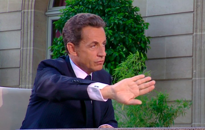 Sarkozy downplays Bettencourt scandal, exhorts French to work harder