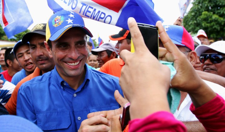 Venezuela: Capriles tries to outdo Chavez in display of dynamism