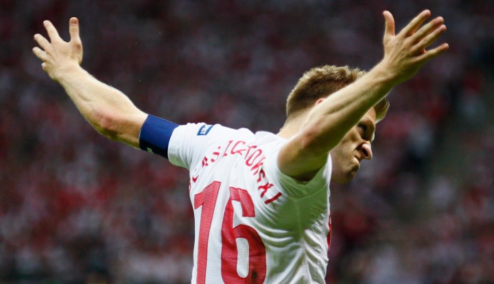 Euro 2012: Captain Kuba saves the day for Poland