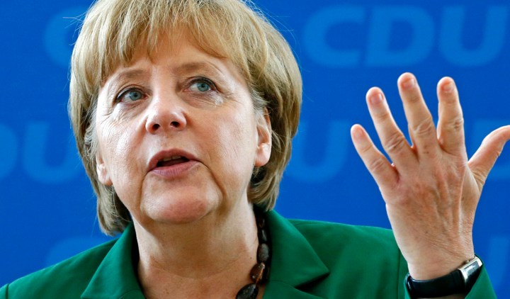 Merkel tries to calm storms over Greece, ECB policy
