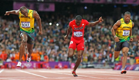 Brilliant Bolt scorches to 100m gold