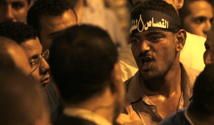 Mursi decree stirs debate on Brotherhood role