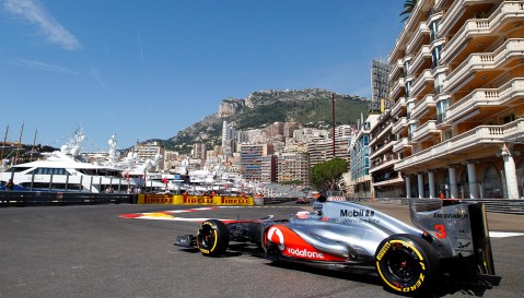 Motor racing-Button flies in wet Monaco practice
