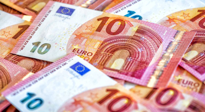 Euro clings to parity with dollar as markets await US inflation data