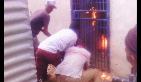 Braamfisherville, Soweto: Burning man. Burning Somali Man.
