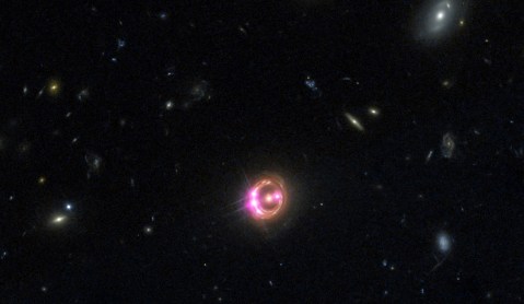 Spin of distant black hole measured at half of speed of light