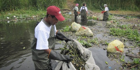 Collecting garbage, creating jobs, finding solutions, saving a river