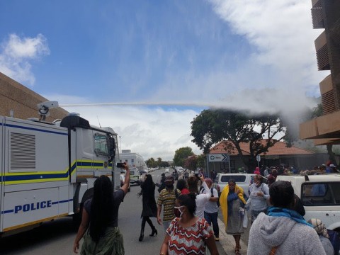 Police probe use of water cannon against social grant applicants