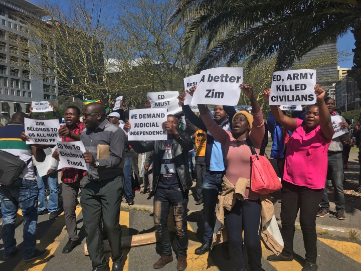 Mnangagwa’s critics and supporters face off in Cape Town