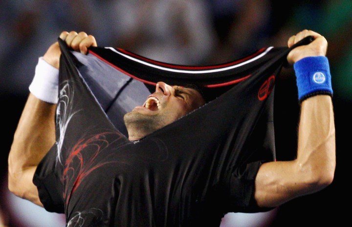 Djokovic triumphs in clash of the titans