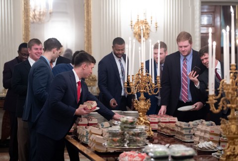 Trump Greets Clemson team with Stacks and Stacks of Fast Food at White House