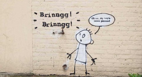 A brief look: Tricksy Banksy plays on words, phones taps