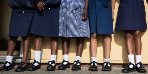 Schools agree to put a halt to uniform price-fixing