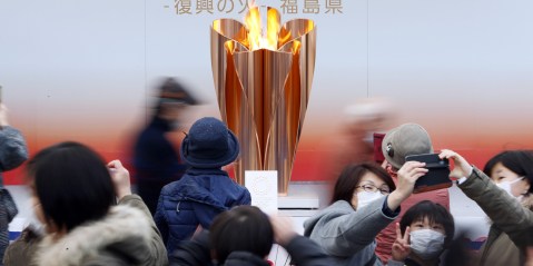 Scandal-hit Tokyo looks to final torchbearer to mend Games’ battered image