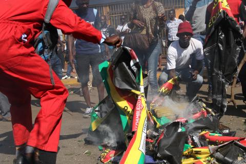 Zimbabwe warns of crackdown after opposition vote protests