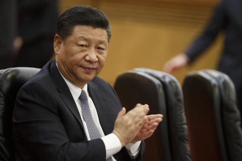 Xi pledges to ‘step up’ opening China’s markets as criticism grows