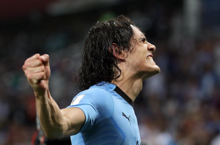 Edinson Cavani of Uruguay celebrates scoring the 2-1 during the FIFA World Cup 2018 round of 16 soccer match between Uruguay and Portugal in Sochi, Russia, 30 June 2018. EPA-EFE/FRIEDEMANN VOGEL