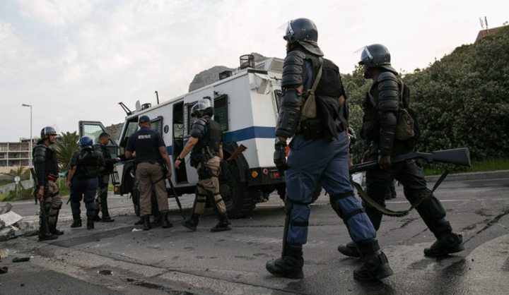 Police fire stun grenades at residents protesting demolition that left 10 homeless