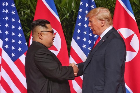 Trump, Kim share historic handshake