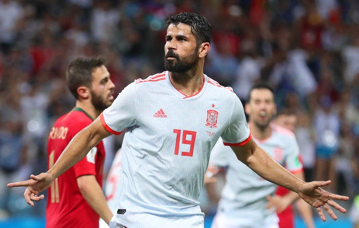Diego Costa of Spain celebrates after scoring the 2-2 equalizer during the FIFA World Cup 2018 group B preliminary round soccer match between Portugal and Spain in Sochi, Russia, 15 June 2018. EPA-EFE/FRIEDEMANN VOGEL