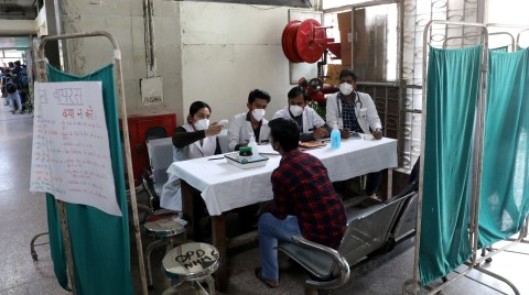 Delhi reserves hospital beds for residents as virus cases surge