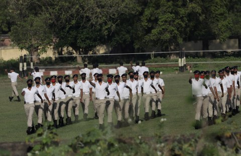 Indian police fire tear gas on jobless workers defying coronavirus lockdown