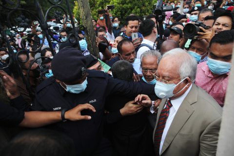 Malaysia’s Najib sentenced to over a decade in jail in first 1MDB graft trial