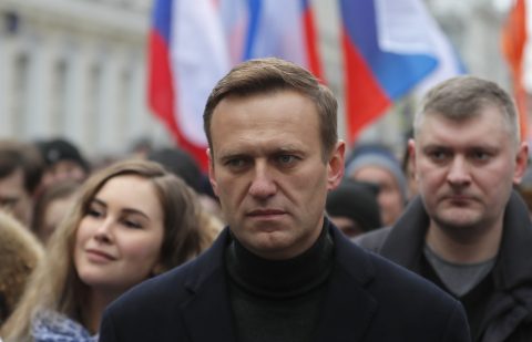 Putin critic Navalny in coma, aides suspect poisoning