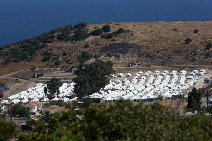 Greek PM promises permanent migrant centre after fire on Lesbos