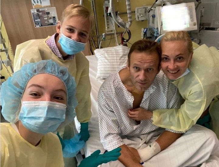 Putin opponent Navalny posts photo from hospital, plans to return to Russia