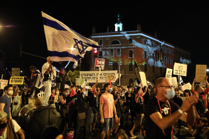 Israelis protest outside Netanyahu’s home after bid to curb demonstrations