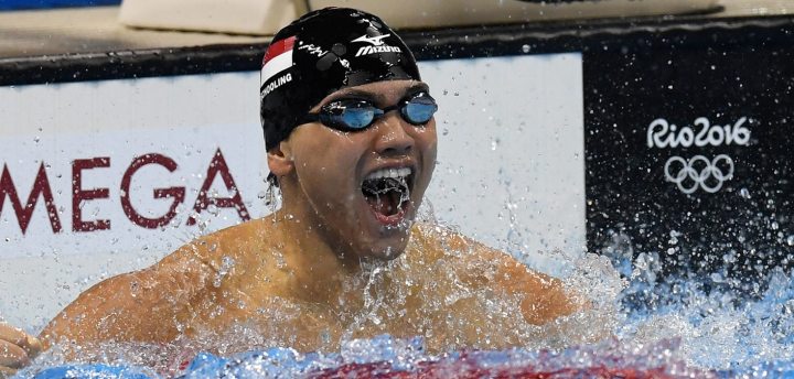 Schooling upsets Phelps in 100m fly final as silver dead-heated three ways