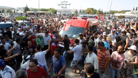 Turmoil hits Tunisia after opposition leader shot dead